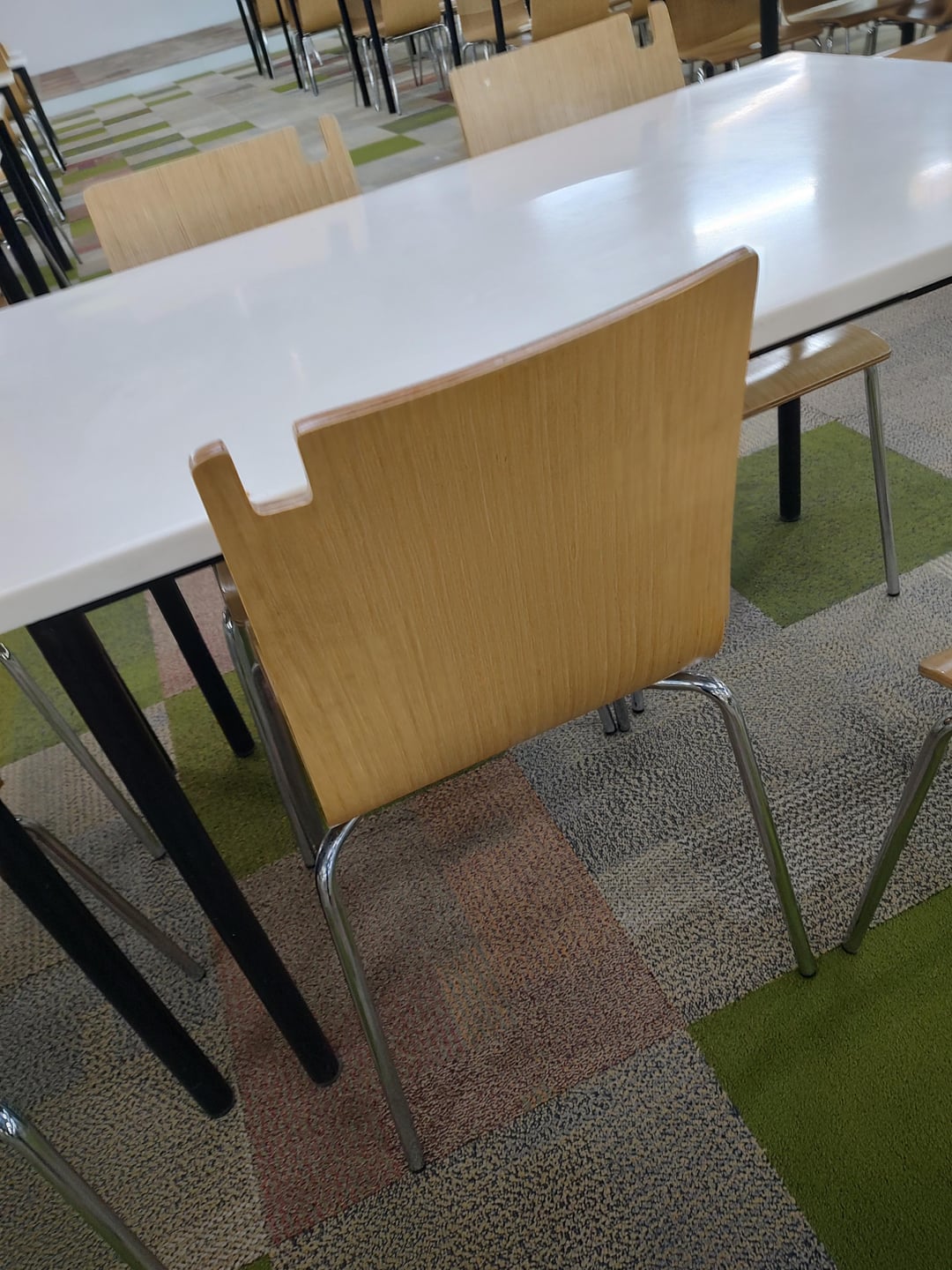 This chair has a notch to hang a bag