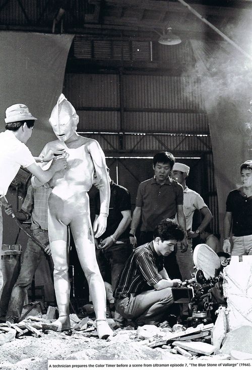 A technician prepares the Color Timer before a scene from Ultraman episode 7, "The Blue Stone of Vallarge" (1966).