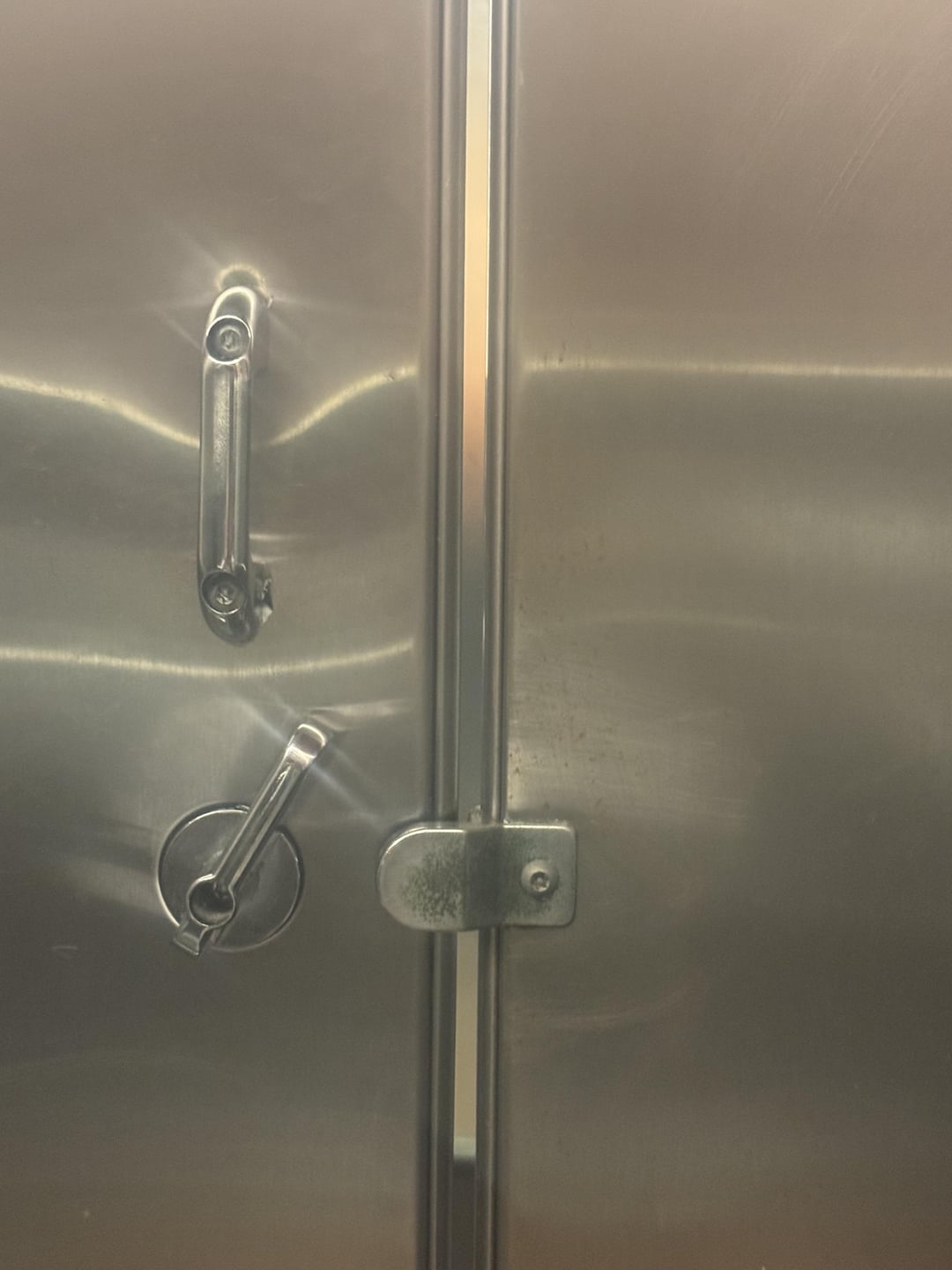 The gap in this bathroom stall