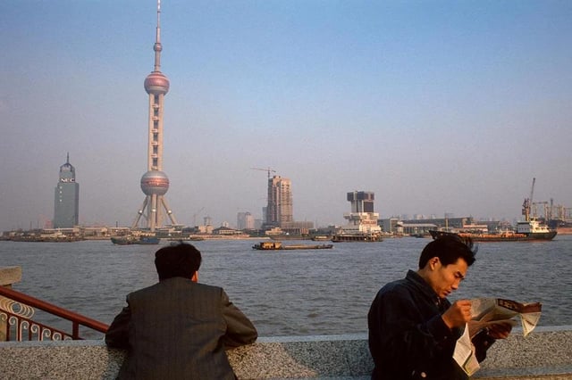 An eerie Shanghai in 1994 as it gets its first high rises.
