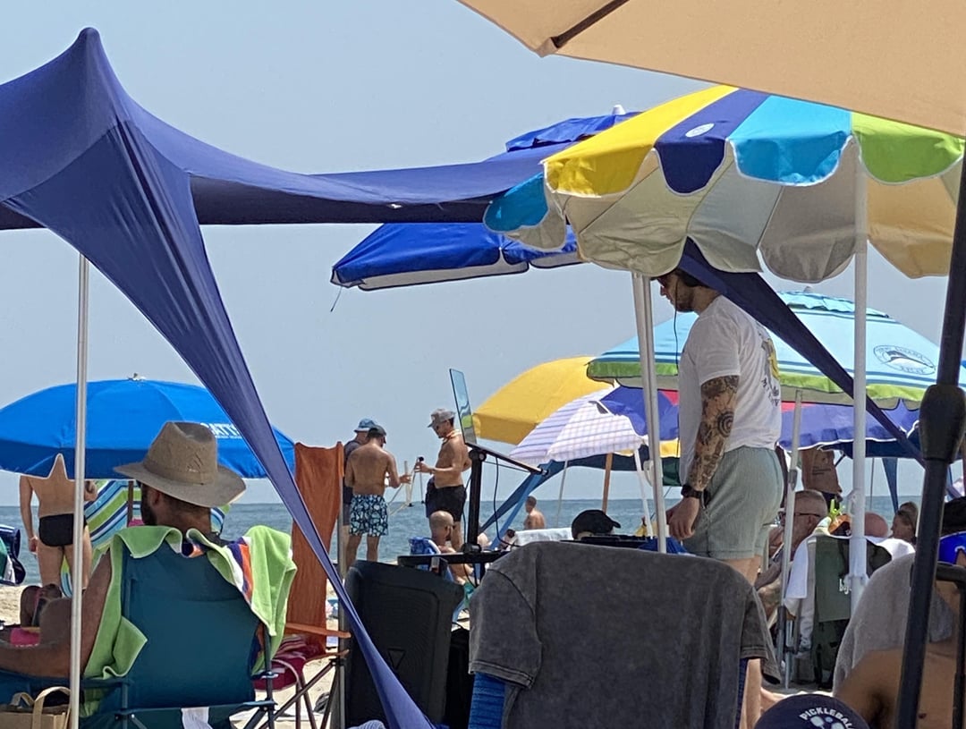 Someone's DJing at a beach