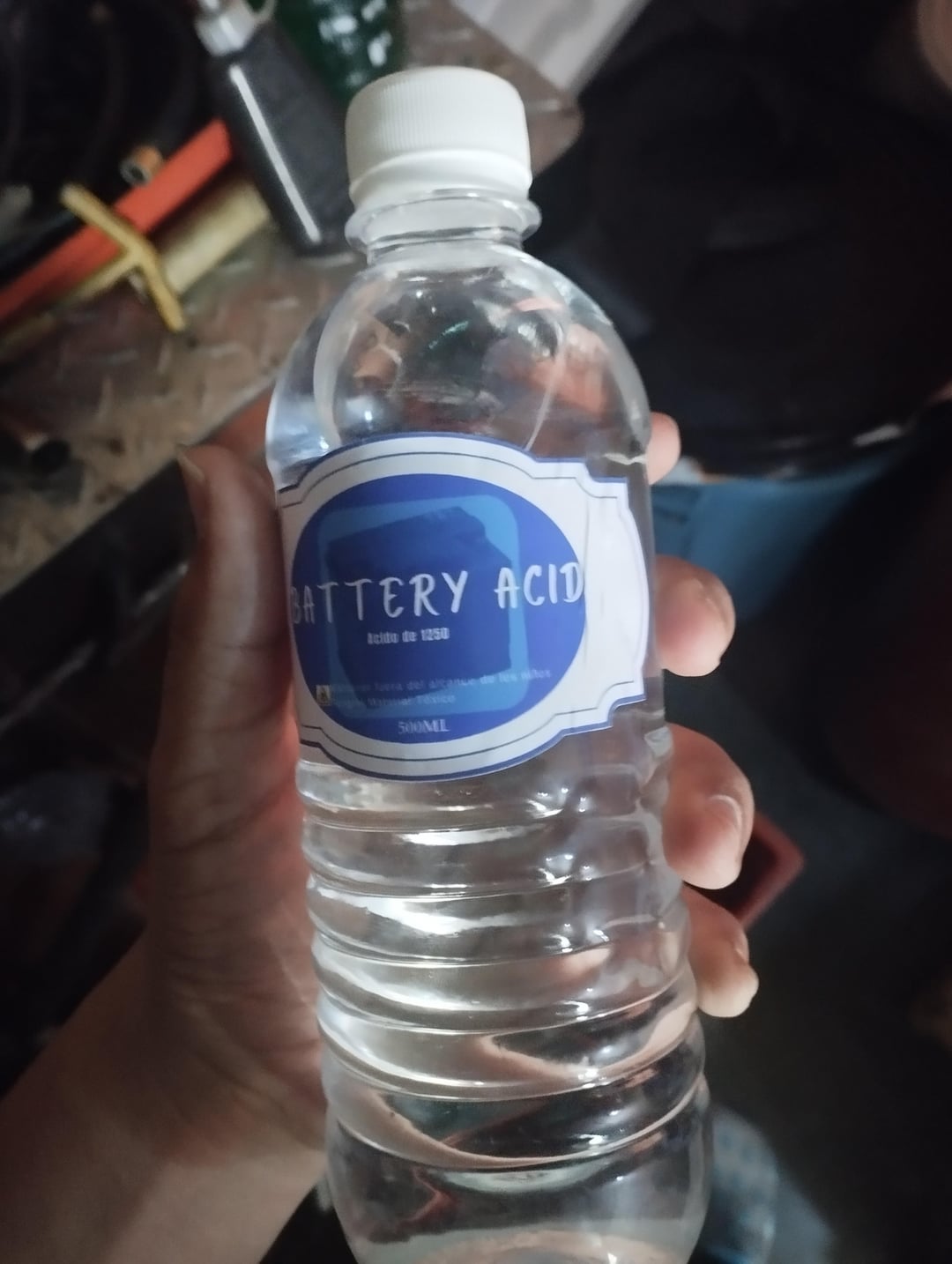BATTERY ACID Acido de 1250 Fra del alcance de les sites Wana Téxico 500ML