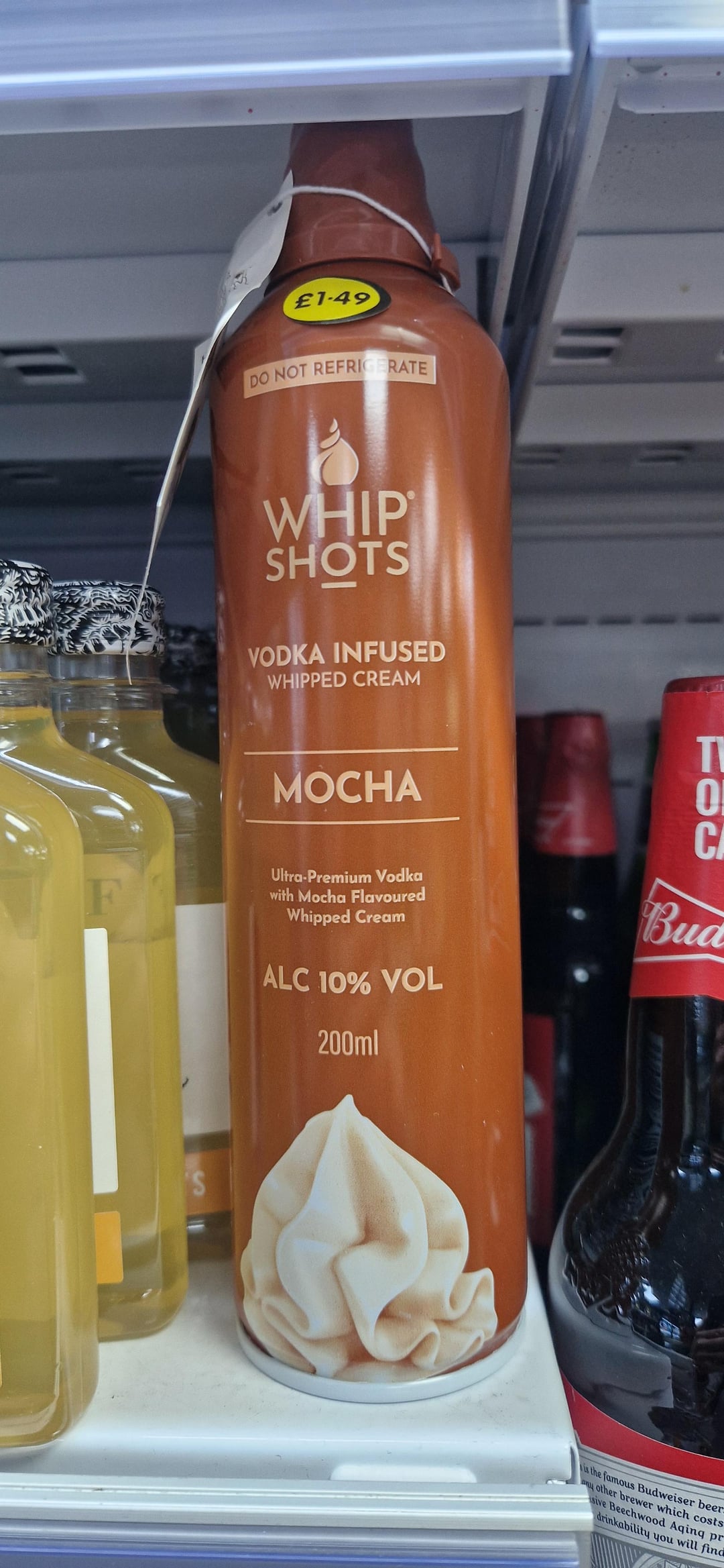 £1-49 DO NOT REFRIGERATE WHIP SHOTS VODKA INFUSED WHIPPED CREAM MOCHA F01 F Ultra-Premium Vodka with Mocha Flavoured Whipped Cream ALC 10% VOL 200ml C Bua 'S is the famous Budweiser beer any other brewer which costs sive Beechwood Aqing pr drinkability you will find