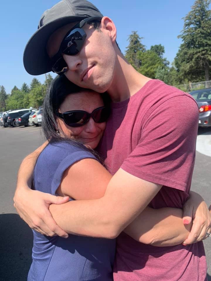 A photo of Tyler Robinson and his mom, sourced from his mom's "Facebook":https://knowyourmeme.com/memes/sites/facebook-meta page, shortly after he was identified as the suspected shooter who killed "Charlie Kirk":https://knowyourmeme.com/memes/events/charlie-kirk-shooting-at-utah-valley-university.