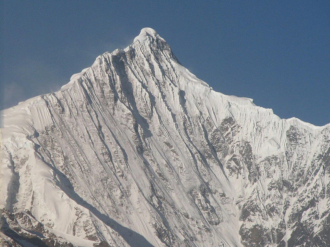 TIL that mountain Kawagarbo was never summited
