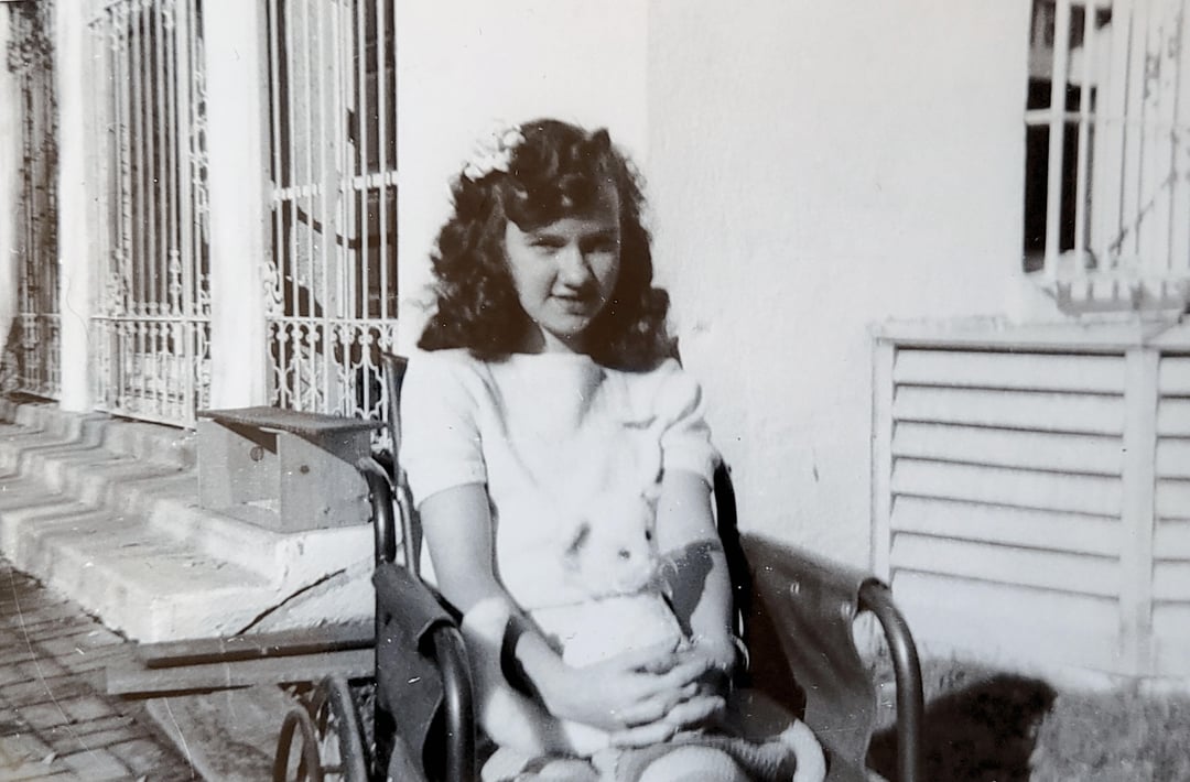 A girl in a wheelchair in the '40s