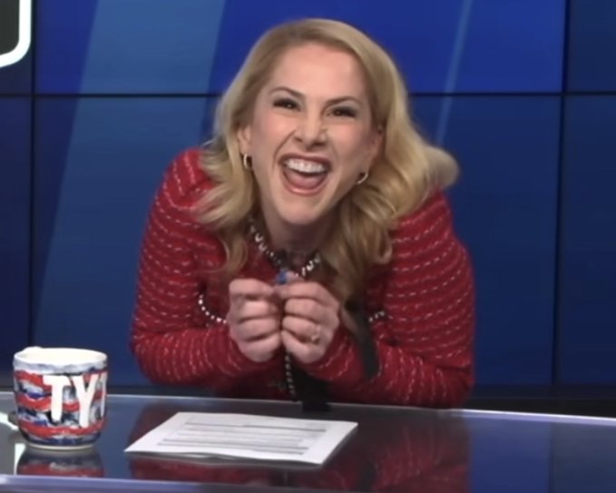 An image of Ana Kasparian in which she arguably resembles the Happy Merchant. The image comes from a clip where she criticizes Larry Ellison.