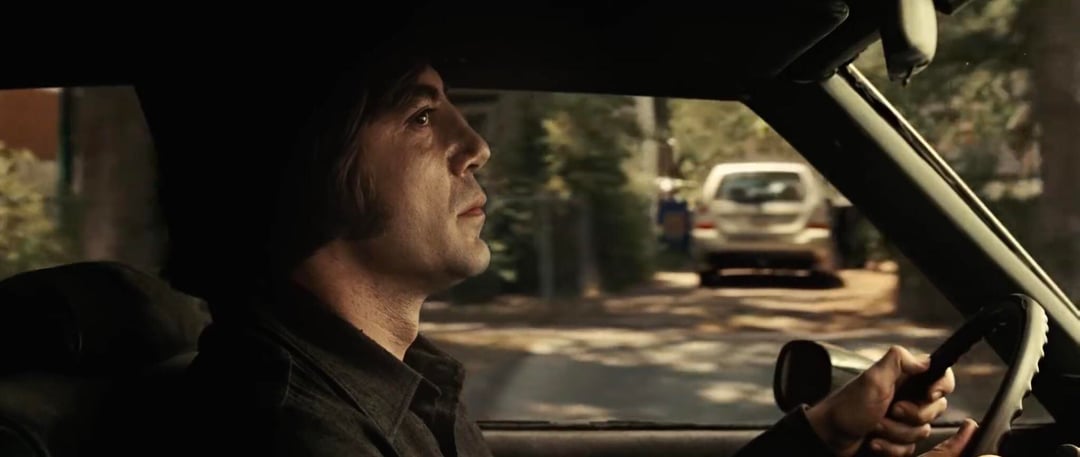 In No Country For Old Men (2007), while Anton Chigurh is driving in a neighborhood, a 2004 Subaru Fo...