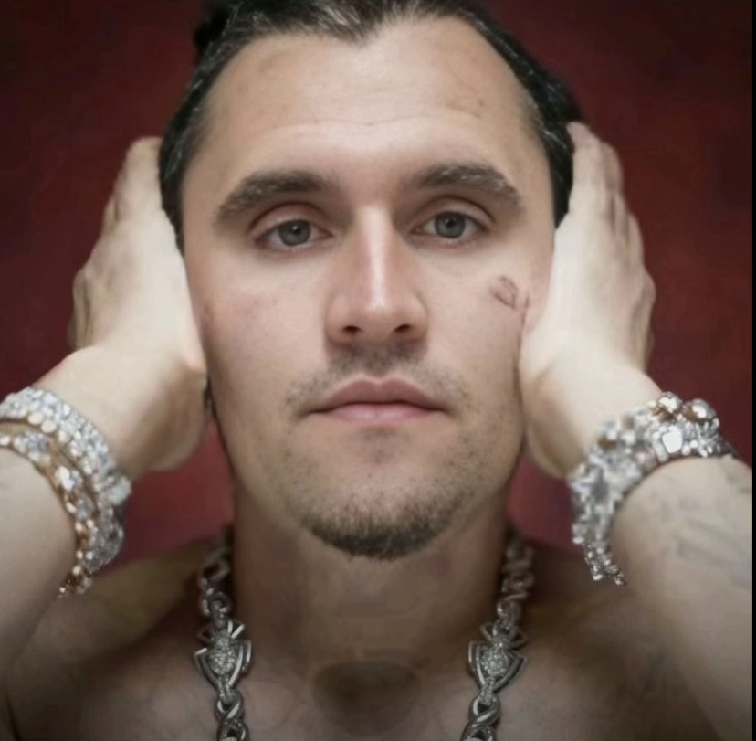 A "face swap":https://knowyourmeme.com/memes/face-swap "meme":https://knowyourmeme.com/memes/memes of "Charlie Kirk":https://knowyourmeme.com/memes/people/charlie-kirk on the "Young Thug _Ninja_":https://knowyourmeme.com/memes/young-thugs-ninja cover.