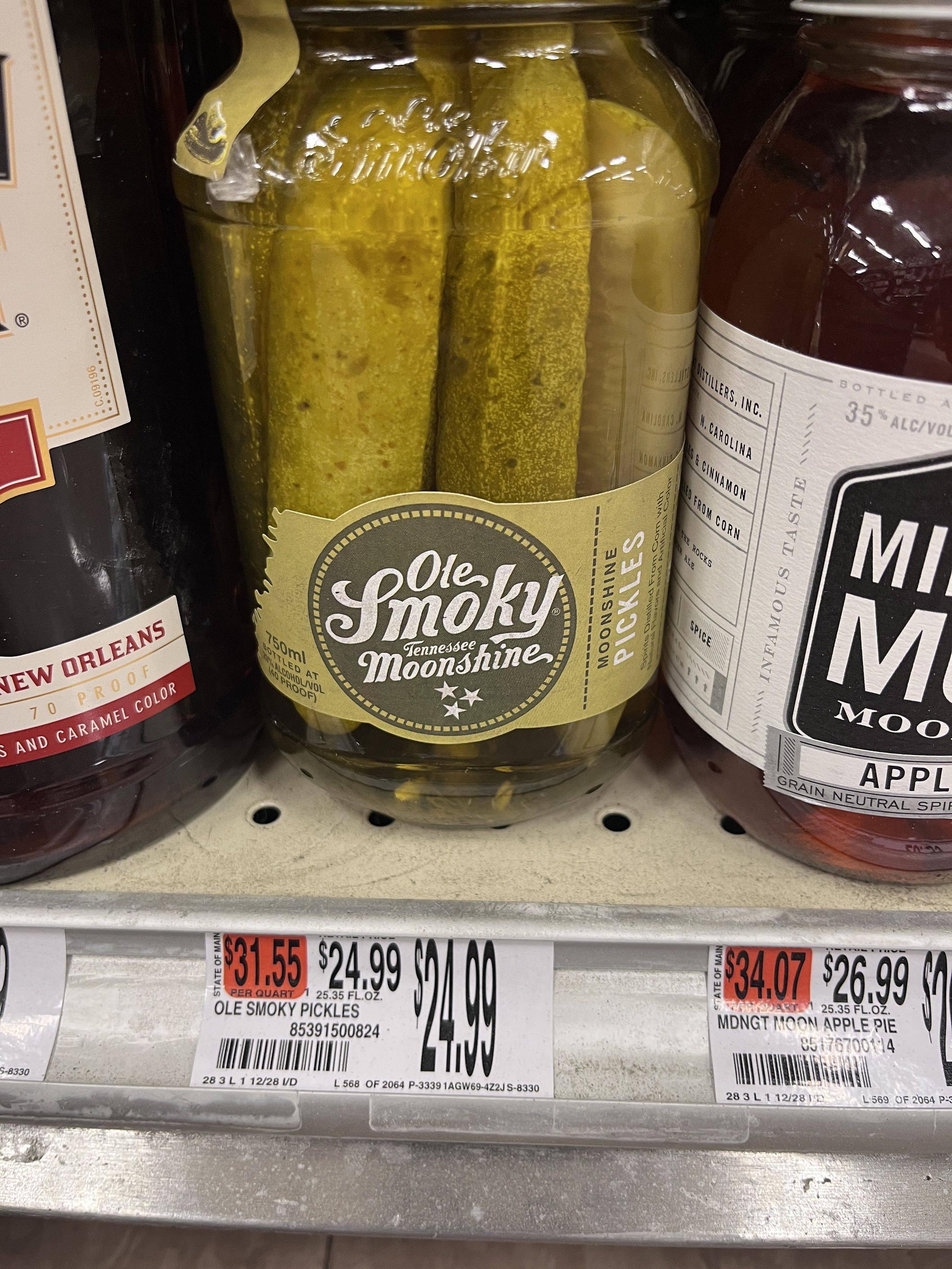 C.09196 NEW ORLEANS 70 PROOF S AND CARAMEL COLOR Ole Smoky Tennessee Moonshine 750ml BOTTLED AT 20% ALCOHOL/VOL 40 PROOF) $31.55 $24.99 PER QUART 125.35 FL.OZ OLE SMOKY PICKLES 85391500824 $249 ISTILLERS, INC. N.CAROLINA S & CINNAMON 11111 LED FROM CORN MOONSHINE PICKLES Natural Flavors and Aom with Spirits Distilled From Artificial THE ROCKS ALE SPICE wwwwww INFAMOUS TASTE BOTTLED 35% ALC/VOL MI M MOO APPL GRAIN NEUTRAL SPIR $34.07 $26.99 HDJART 25.35 FL.OZ. MDNGT MOON APPLE PIE 95176700114 S-8330 28 3 L 1 12/28 I/D L 568 OF 2064 P-3339 1AGW69-4Z2J S-8330 28 3 L 1 12/28 L569 OF 2064 P-3