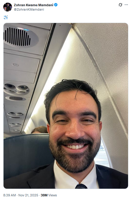 Zohran Mamdani posted a selfie captioned with the plane taking off emoji, smiling on his way to meeting Donald Trump in the White House on November 21st, 2025.