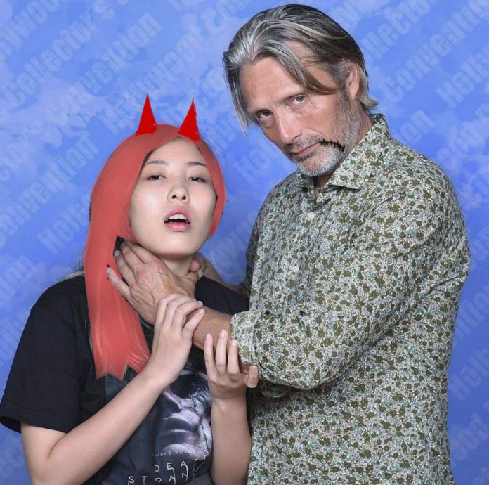 An edit of a photo of Mad Mikkelsen choking a fan. The edit is based on Chainsaw Man.