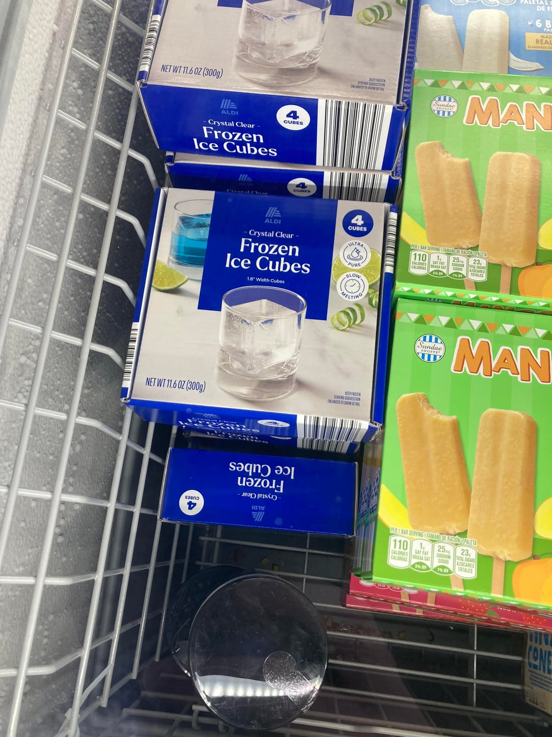 NET WT 11.6 OZ (300g) ALDI Crystal Clear Frozen Ice Cubes CUBES NET WT 11.6 OZ (300g) CUBES PALETAS C DE F 6 B PA REAL ELASOBADO CO KEEP FROZEN SERVING SUGGESTION ENLARGED TO SHOW DETAIL Sundar #MAN 4 ALDI CUBES Crystal Clear- ULTRA PER 1 BAR SERVING TAMAÑO DE RAGION PALETA Frozen Ice Cubes PURE SLOW 110 SATAT CALORIES CASE CALORIES RASA SAT 25 100UM 23, TOTALES 1.8" Width Cubes MELTING Saqn) ၁၁၊ รายก + เสาษ KEEP FROZEN SERVING SUGGESTION ENLARGED TO SHOW DETAIL Sundae SHOPPE MAN PER 1 BAR SERVING TAMAÑO DE RACION OPALETA 110 1 CALORIES CALORIAS 20 SAT FAT GRASA SAT SODID 5% BY 1% DY