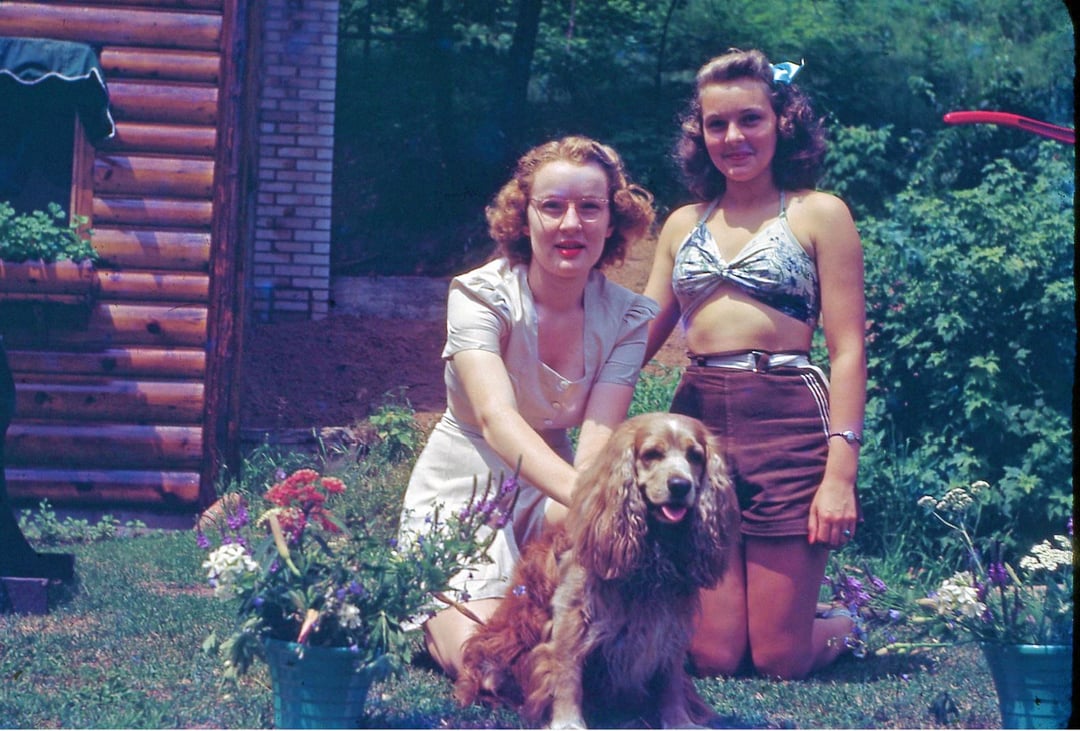 Friends and their dog, 1940s