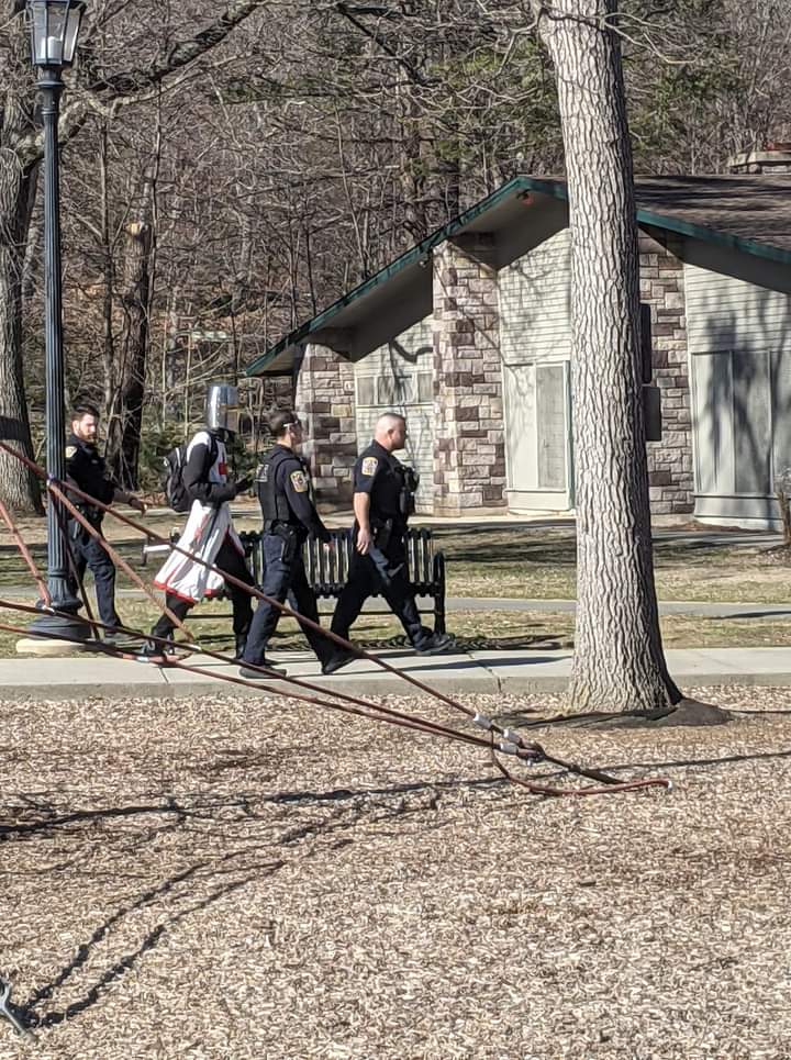 It's a knight being escorted by police in the state of Connecticut
