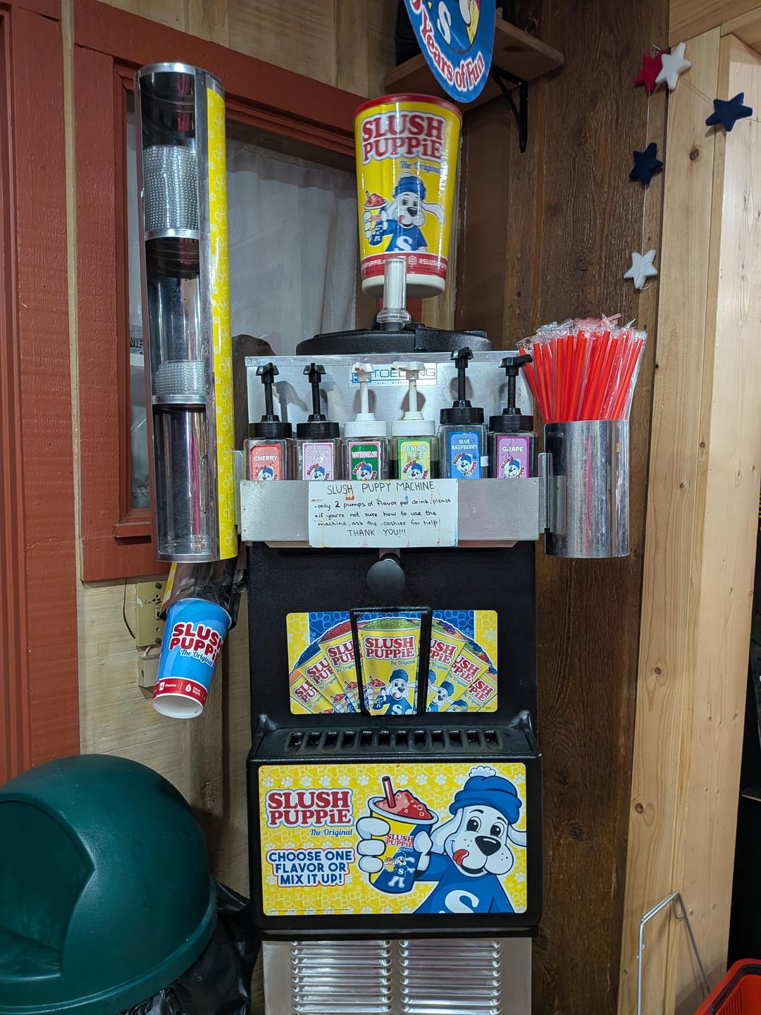 SLUSH PUPPIE SLUS ME TOEL NG The Origina SLUSH PUPPY MACHINE only 2 pumps of flavor pet drink, please if you're not sure how to use the machine, ask the cashier for help! THANK YOU!!! SLUSH PUPPIE The Original CHOOSE ONE FLAVOR OR MIX IT UP! SLUSH PUPPIE GRAPE