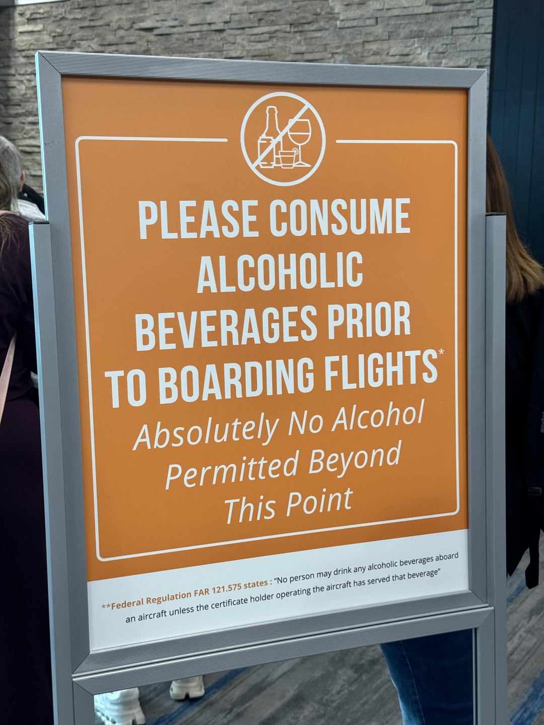 PLEASE CONSUME ALCOHOLIC BEVERAGES PRIOR TO BOARDING FLIGHTS Absolutely No Alcohol Permitted Beyond This Point **Federal Regulation FAR 121.575 states: "No person may drink any alcoholic beverages aboard an aircraft unless the certificate holder operating the aircraft has served that beverage"