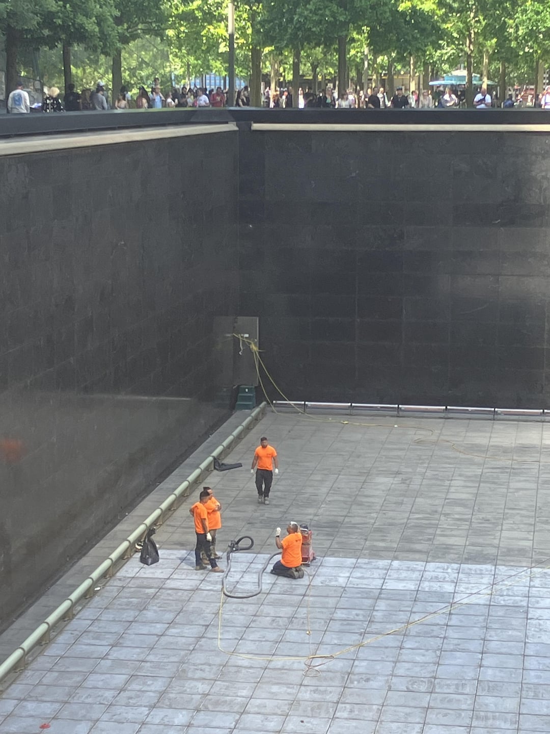 The inside of the 9/11 memorial with the water turned off
