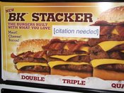 BK STACKER WITHHAT YOU LOVE [citation needed] THE BURGERS BUILT Meat! Cheese Bacon! DOUBLE TRIPLE QUP